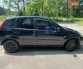 Черный Форд Фиеста, объемом двигателя 1.4 л и пробегом 285 тыс. км за 2800 $, фото 7 на Automoto.ua