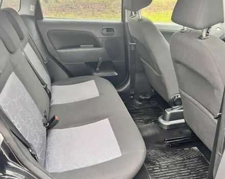 Черный Форд Фиеста, объемом двигателя 1.39 л и пробегом 210 тыс. км за 3750 $, фото 11 на Automoto.ua