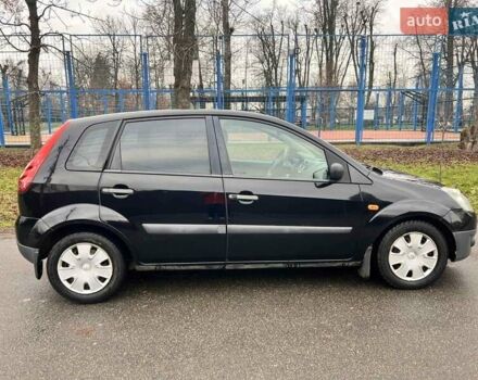 Черный Форд Фиеста, объемом двигателя 1.39 л и пробегом 210 тыс. км за 3750 $, фото 10 на Automoto.ua