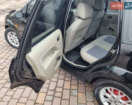 Черный Форд Фиеста, объемом двигателя 1.4 л и пробегом 233 тыс. км за 4650 $, фото 11 на Automoto.ua