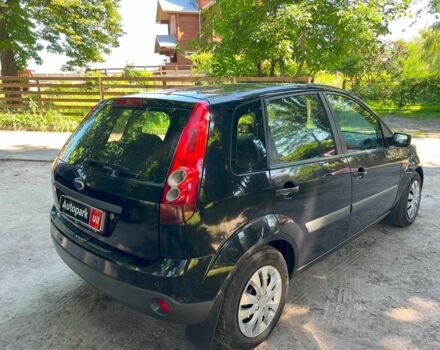 Черный Форд Фиеста, объемом двигателя 1.4 л и пробегом 305 тыс. км за 3990 $, фото 4 на Automoto.ua