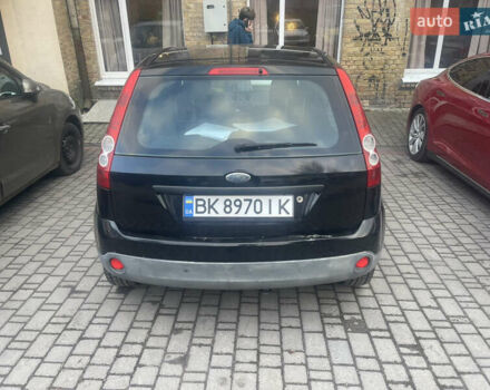 Черный Форд Фиеста, объемом двигателя 1.3 л и пробегом 350 тыс. км за 3650 $, фото 1 на Automoto.ua