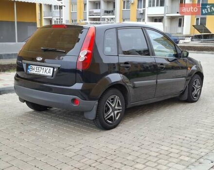 Черный Форд Фиеста, объемом двигателя 1.39 л и пробегом 220 тыс. км за 3800 $, фото 4 на Automoto.ua