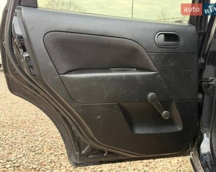 Черный Форд Фиеста, объемом двигателя 1.2 л и пробегом 165 тыс. км за 2900 $, фото 18 на Automoto.ua