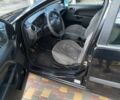 Чорний Форд Фієста, об'ємом двигуна 1.4 л та пробігом 150 тис. км за 4004 $, фото 4 на Automoto.ua