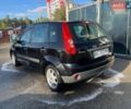 Чорний Форд Фієста, об'ємом двигуна 1.4 л та пробігом 223 тис. км за 4400 $, фото 5 на Automoto.ua