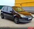 Черный Форд Фиеста, объемом двигателя 1.4 л и пробегом 220 тыс. км за 3800 $, фото 1 на Automoto.ua