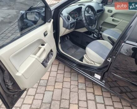 Черный Форд Фиеста, объемом двигателя 1.4 л и пробегом 233 тыс. км за 4650 $, фото 10 на Automoto.ua