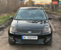 Черный Форд Фиеста, объемом двигателя 1.4 л и пробегом 270 тыс. км за 3250 $, фото 1 на Automoto.ua