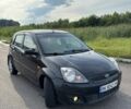 Черный Форд Фиеста, объемом двигателя 1.4 л и пробегом 215 тыс. км за 3900 $, фото 1 на Automoto.ua