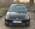 Черный Форд Фиеста, объемом двигателя 1.4 л и пробегом 250 тыс. км за 4000 $, фото 1 на Automoto.ua