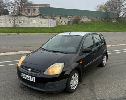 Черный Форд Фиеста, объемом двигателя 1.25 л и пробегом 116 тыс. км за 3800 $, фото 6 на Automoto.ua
