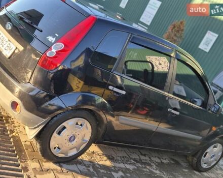 Чорний Форд Фієста, об'ємом двигуна 1.39 л та пробігом 148 тис. км за 4400 $, фото 4 на Automoto.ua