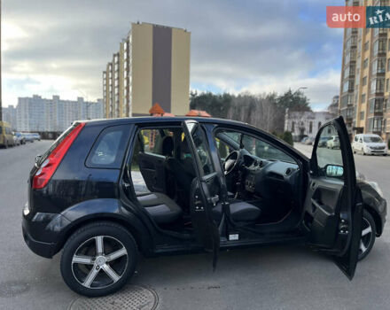 Черный Форд Фиеста, объемом двигателя 1.4 л и пробегом 210 тыс. км за 4200 $, фото 12 на Automoto.ua