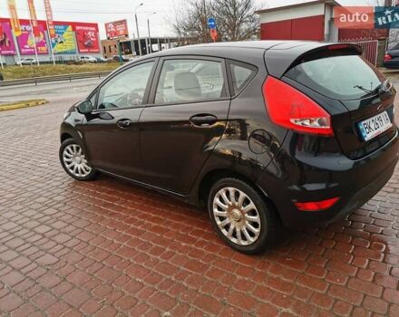 Черный Форд Фиеста, объемом двигателя 1.25 л и пробегом 99 тыс. км за 5750 $, фото 4 на Automoto.ua