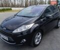 Черный Форд Фиеста, объемом двигателя 1.56 л и пробегом 219 тыс. км за 6400 $, фото 1 на Automoto.ua