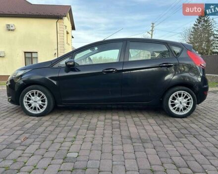 Черный Форд Фиеста, объемом двигателя 1.6 л и пробегом 210 тыс. км за 5000 $, фото 6 на Automoto.ua