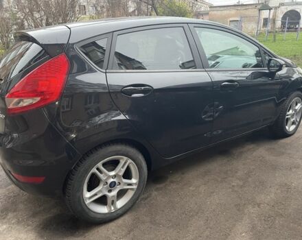 Черный Форд Фиеста, объемом двигателя 1.4 л и пробегом 147 тыс. км за 5254 $, фото 1 на Automoto.ua