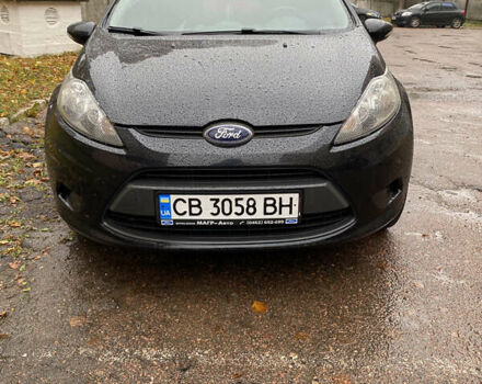 Черный Форд Фиеста, объемом двигателя 1.25 л и пробегом 180 тыс. км за 6700 $, фото 1 на Automoto.ua