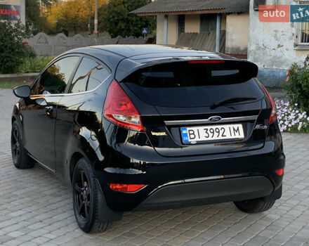 Черный Форд Фиеста, объемом двигателя 1.4 л и пробегом 185 тыс. км за 5400 $, фото 12 на Automoto.ua