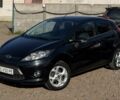 Черный Форд Фиеста, объемом двигателя 1.4 л и пробегом 256 тыс. км за 6700 $, фото 1 на Automoto.ua