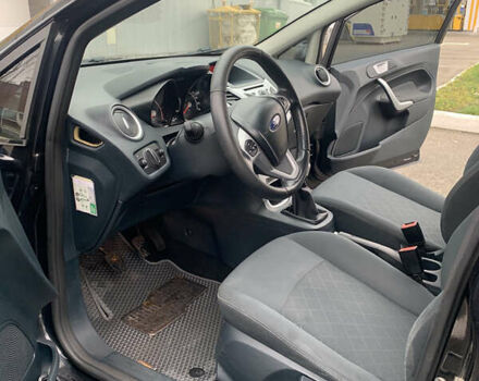 Черный Форд Фиеста, объемом двигателя 1.56 л и пробегом 322 тыс. км за 6200 $, фото 6 на Automoto.ua