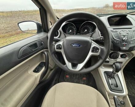 Черный Форд Фиеста, объемом двигателя 1.6 л и пробегом 117 тыс. км за 6800 $, фото 16 на Automoto.ua