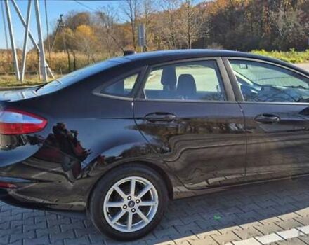 Черный Форд Фиеста, объемом двигателя 1.6 л и пробегом 175 тыс. км за 8950 $, фото 6 на Automoto.ua