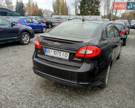 Чорний Форд Фієста, об'ємом двигуна 1.6 л та пробігом 240 тис. км за 5990 $, фото 1 на Automoto.ua