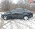 Черный Форд Фиеста, объемом двигателя 1.6 л и пробегом 217 тыс. км за 7700 $, фото 6 на Automoto.ua