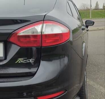 Черный Форд Фиеста, объемом двигателя 1.6 л и пробегом 168 тыс. км за 5900 $, фото 7 на Automoto.ua