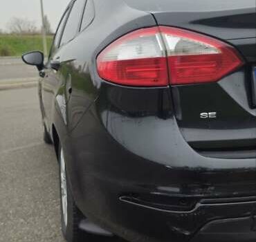 Черный Форд Фиеста, объемом двигателя 1.6 л и пробегом 168 тыс. км за 5900 $, фото 5 на Automoto.ua