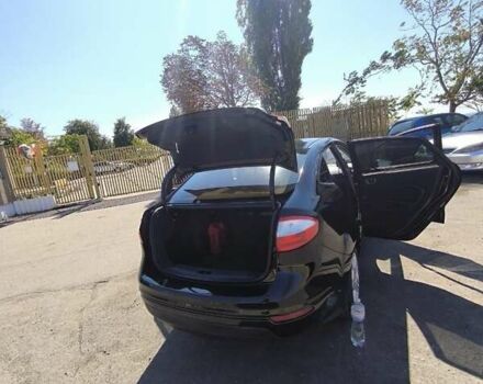 Черный Форд Фиеста, объемом двигателя 1.6 л и пробегом 150 тыс. км за 7000 $, фото 2 на Automoto.ua