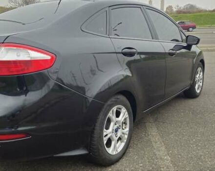 Черный Форд Фиеста, объемом двигателя 1.6 л и пробегом 168 тыс. км за 5900 $, фото 10 на Automoto.ua