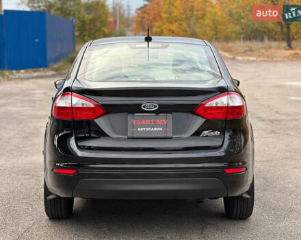 Черный Форд Фиеста, объемом двигателя 1.6 л и пробегом 298 тыс. км за 6500 $, фото 4 на Automoto.ua