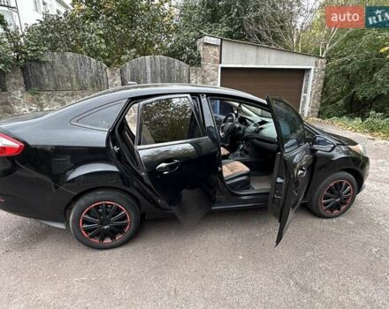 Черный Форд Фиеста, объемом двигателя 1.6 л и пробегом 77 тыс. км за 10500 $, фото 13 на Automoto.ua