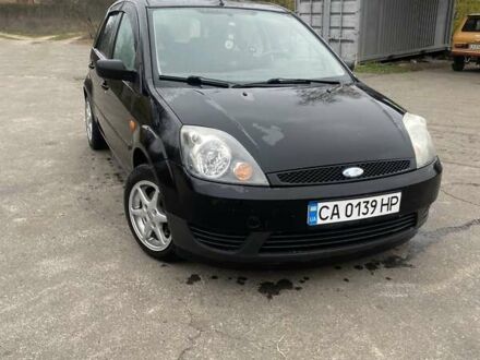 Черный Форд Фиеста, объемом двигателя 1.39 л и пробегом 180 тыс. км за 3600 $, фото 1 на Automoto.ua