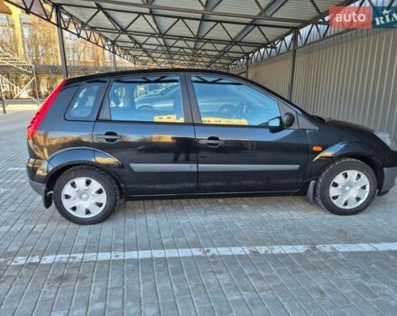 Черный Форд Фиеста, объемом двигателя 1.4 л и пробегом 202 тыс. км за 3000 $, фото 1 на Automoto.ua