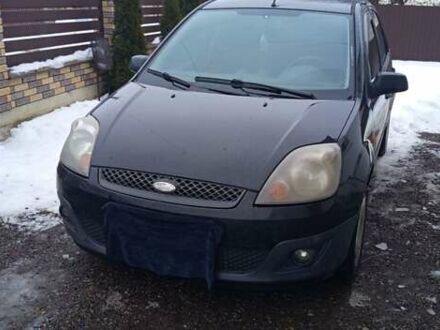 Черный Форд Фиеста, объемом двигателя 1.39 л и пробегом 200 тыс. км за 4200 $, фото 1 на Automoto.ua