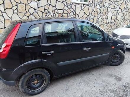 Черный Форд Фиеста, объемом двигателя 1.4 л и пробегом 170 тыс. км за 3800 $, фото 1 на Automoto.ua