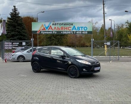 Черный Форд Фиеста, объемом двигателя 1.6 л и пробегом 323 тыс. км за 5400 $, фото 1 на Automoto.ua