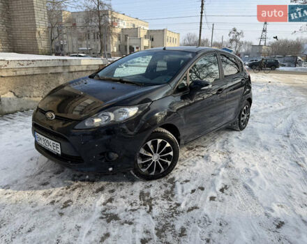 Черный Форд Фиеста, объемом двигателя 1.25 л и пробегом 206 тыс. км за 6250 $, фото 1 на Automoto.ua