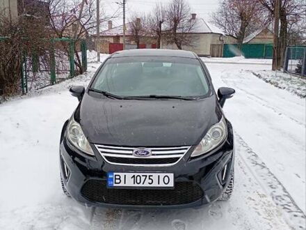 Черный Форд Фиеста, объемом двигателя 1.6 л и пробегом 241 тыс. км за 6200 $, фото 1 на Automoto.ua