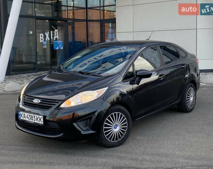 Черный Форд Фиеста, объемом двигателя 1.6 л и пробегом 200 тыс. км за 6900 $, фото 1 на Automoto.ua