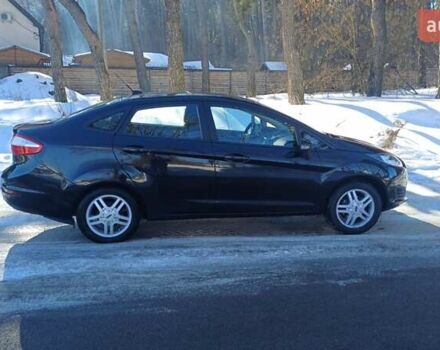 Черный Форд Фиеста, объемом двигателя 1.6 л и пробегом 98 тыс. км за 8300 $, фото 1 на Automoto.ua