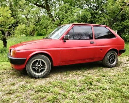 Красный Форд Фиеста, объемом двигателя 1.1 л и пробегом 84 тыс. км за 699 $, фото 2 на Automoto.ua