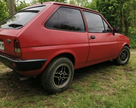 Красный Форд Фиеста, объемом двигателя 1.1 л и пробегом 84 тыс. км за 699 $, фото 3 на Automoto.ua