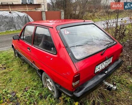 Красный Форд Фиеста, объемом двигателя 1.3 л и пробегом 300 тыс. км за 663 $, фото 5 на Automoto.ua