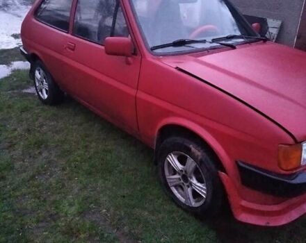 Красный Форд Фиеста, объемом двигателя 1.1 л и пробегом 100 тыс. км за 711 $, фото 3 на Automoto.ua