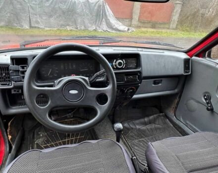 Красный Форд Фиеста, объемом двигателя 1.3 л и пробегом 300 тыс. км за 663 $, фото 4 на Automoto.ua